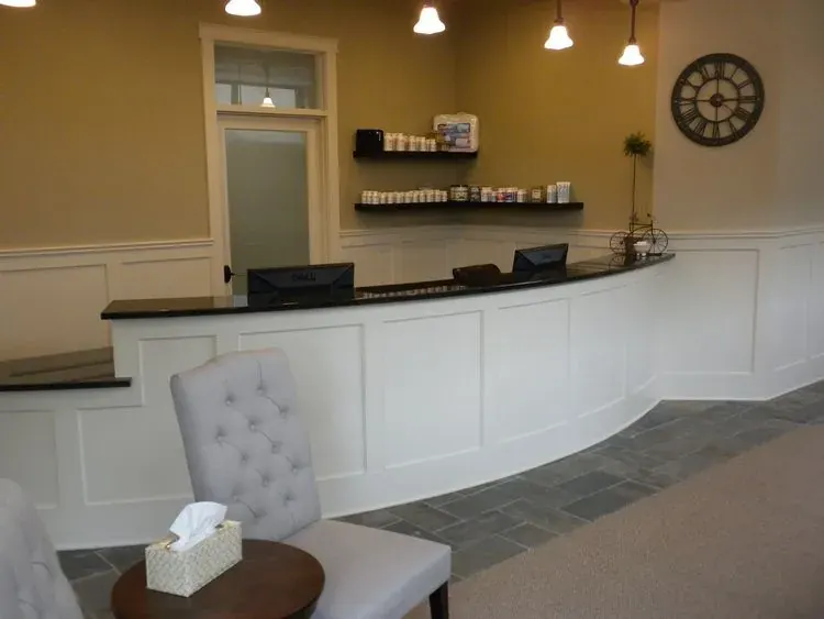 Lobby seating by the front windows at Fortier Chiropractic